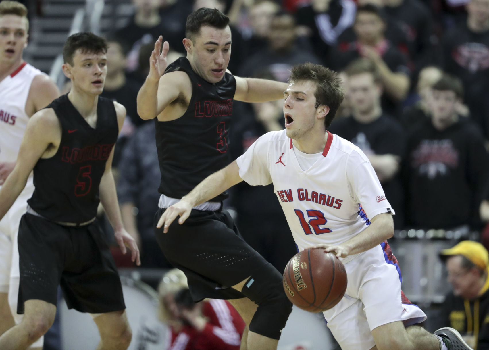 WIAA boys basketball photo: New Glarus senior Jaden Kreklow
